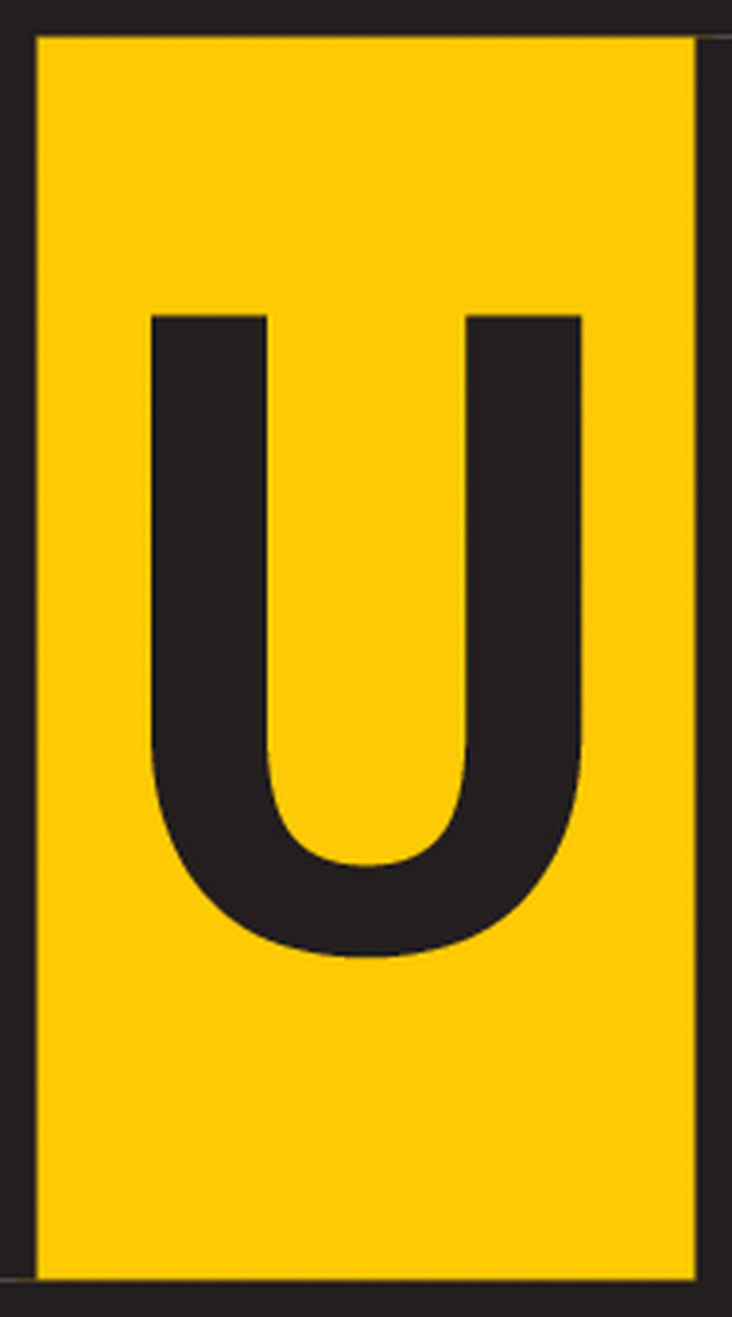 Žluté obdélníkové znamení s velkým černým písmenem 'U' uprostřed.