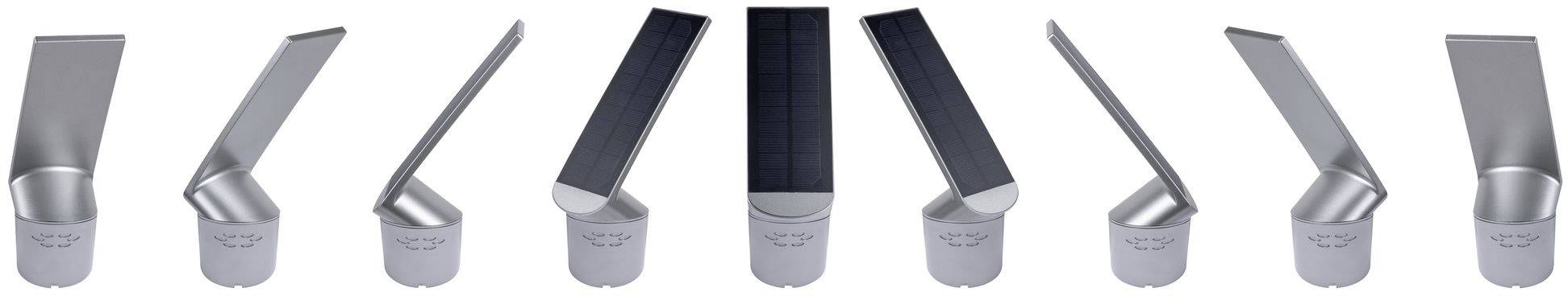 Několik stříbrných a černých solárních lamp umístěných v různých úhlech, které demonstrují jejich design a všestrannost.