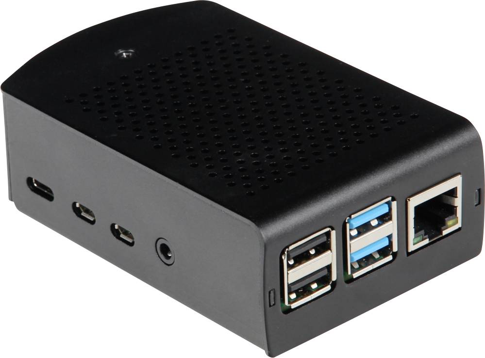 Černá skříň pro minipočítač s několika USB porty a ethernetovým portem na přední straně.