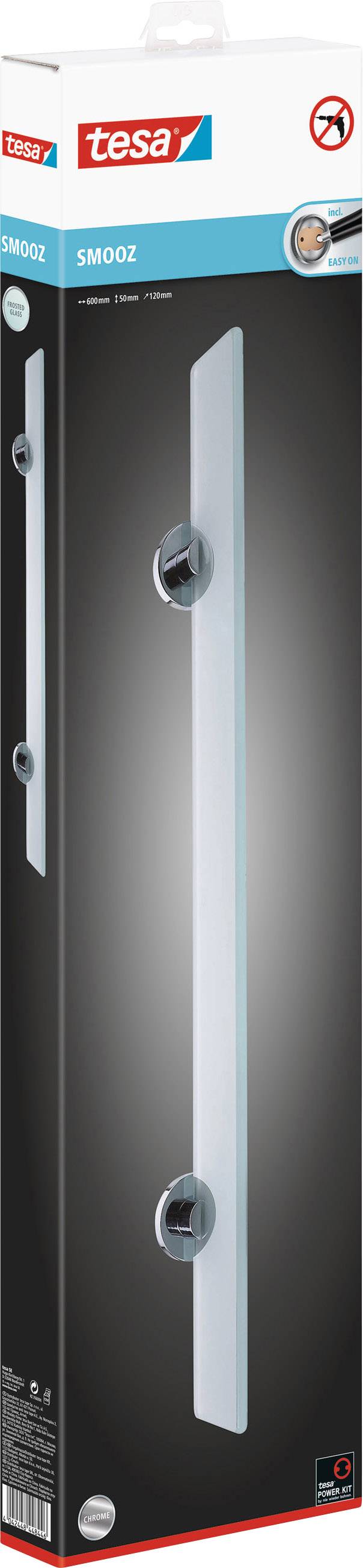 Na obrázku je zobrazeno balení stříbrné kliky tesa SMOOZ. Vhodná pro skleněné dveře, s moderním a minimalistickým designem.