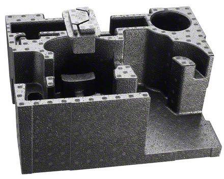 Šedý, komplexně tvarovaný kovový blok s různými průchodkami a dutinami. Možnost mechanického upevnění.