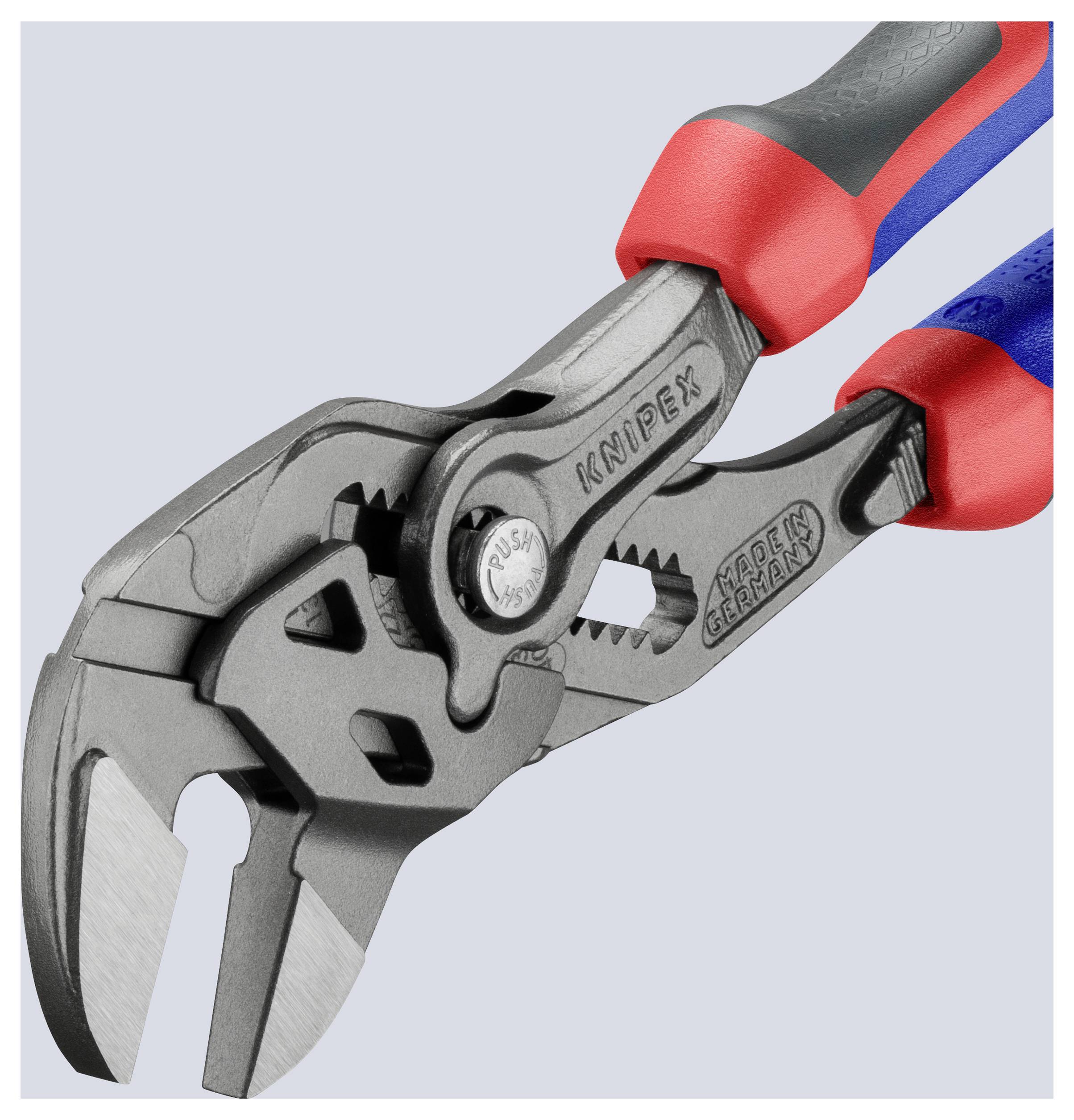 Pár kleští Knipex s červenými a modrými rukovětmi, vybavené přesnými řeznými hranami a robustním, ergonomickým designem pro chytání a řezání.