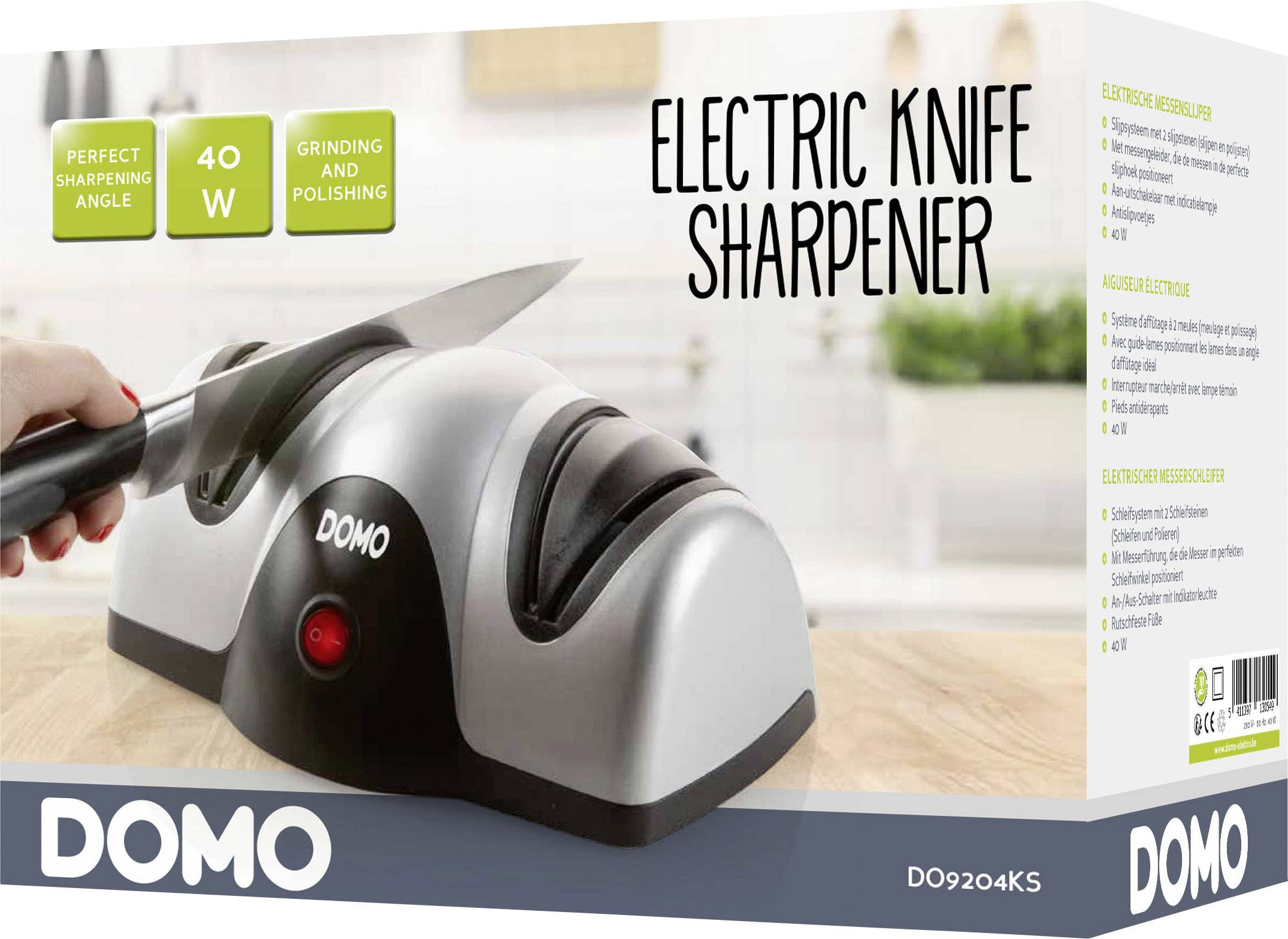 Obal elektrické brusky na nože s rukou, která drží nůž a pohybuje se nad zařízením. Text: 'Dokonalý úhel broušení', '40 W'. Značka: 'DOMO'.