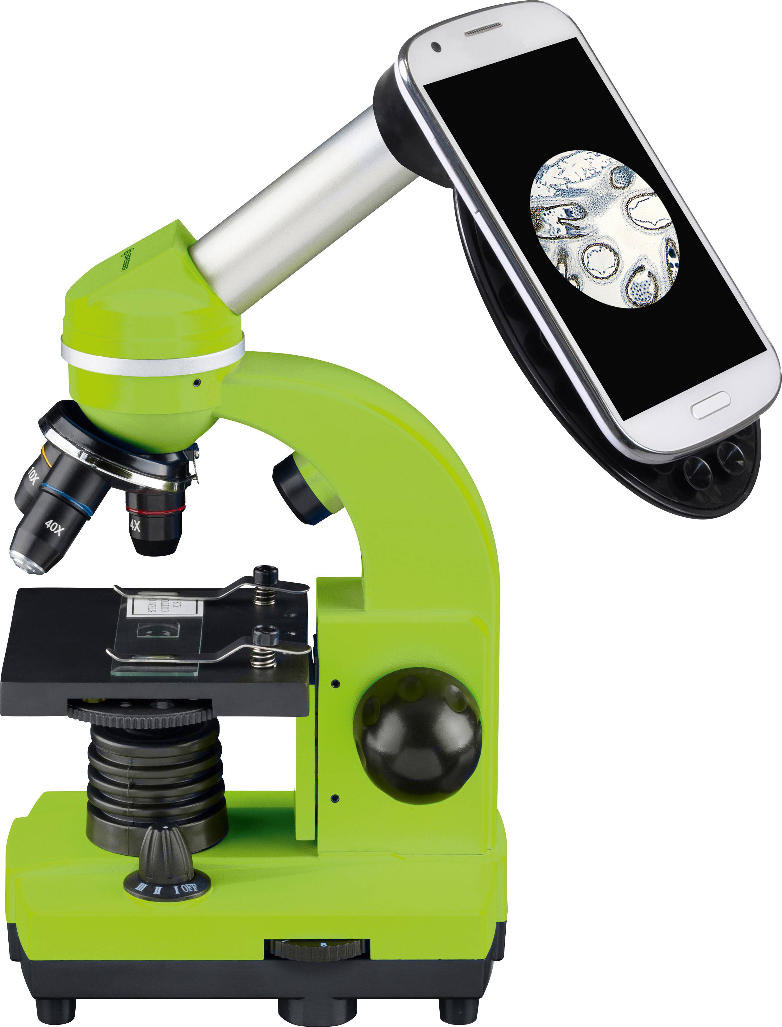 Zelený mikroskop s adaptérem pro smartphone, na obrazovce smartphonu je vidět mikroskopický snímek buněk.