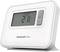 Digitální termostat společnosti Honeywell Home zobrazuje '09:30 dop.' a '21,5 °C'. Má tlačítka plus a mínus pro nastavení teploty.