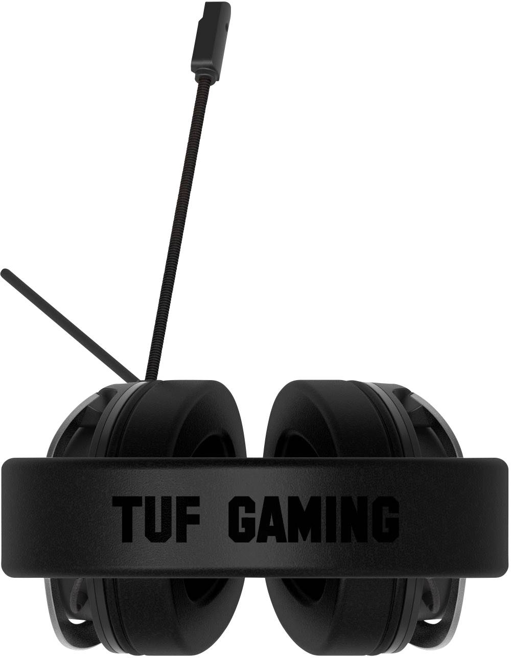 Černá herní sluchátka s mikrofonem, na kterých je text 'TUF GAMING', vyfotografovaná shora.