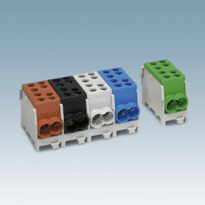 Řada šestipólových svorek v pěti barvách: hnědá, černá, bílá, modrá a zelená, před modrým pozadím.