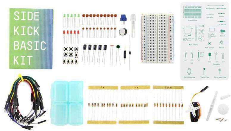 Elektronický stavebnicový set s všestranným komponentami, jako jsou rezistory, LED diody, nepájivé kontaktní pole a kabely, vhodný pro DIY projekty a zapojení.