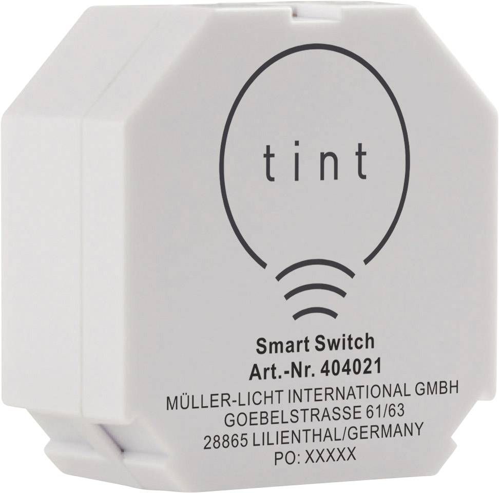 Bílý chytrý spínač od firmy Tint, modelové číslo 404021, s firemní adresou společnosti Müller-Licht International GmbH v Lilienthalu, Německo.