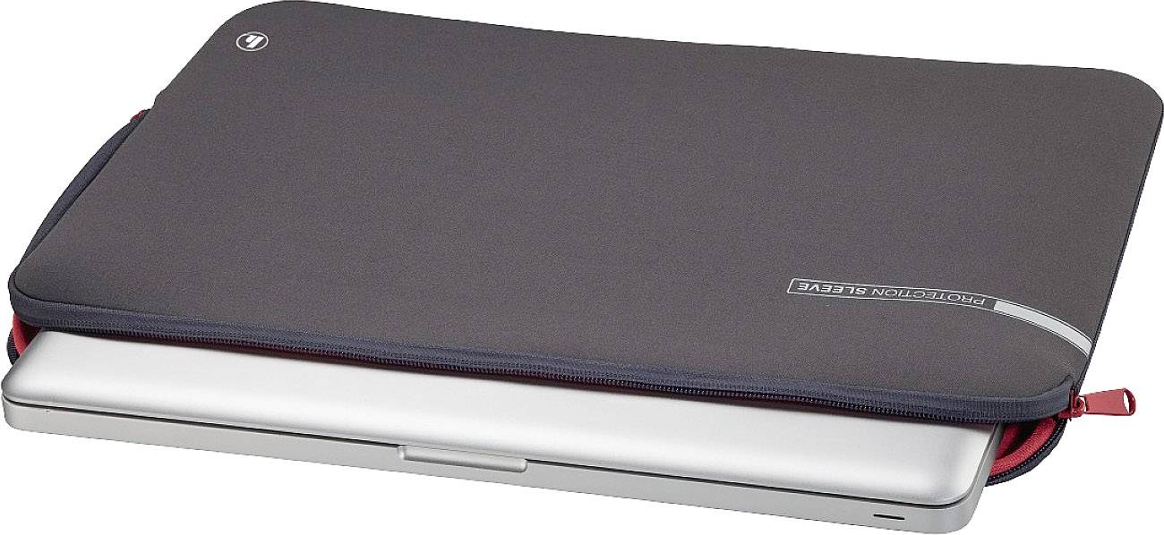Šedočerná taška na notebook položená na z poloviny vysunutém stříbrném laptopu s červeným zipem.