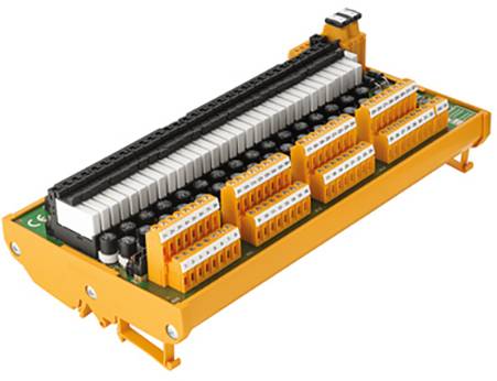 Žlutý propojovací modul s několika svorkovnicemi a konektory, používaný k organizaci a propojení elektrických obvodů.