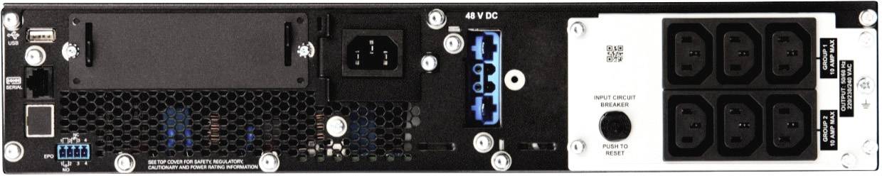 Zadní strana elektronického zařízení s různými konektory, včetně USB portu, napájecího vstupu a několika zásuvkami.