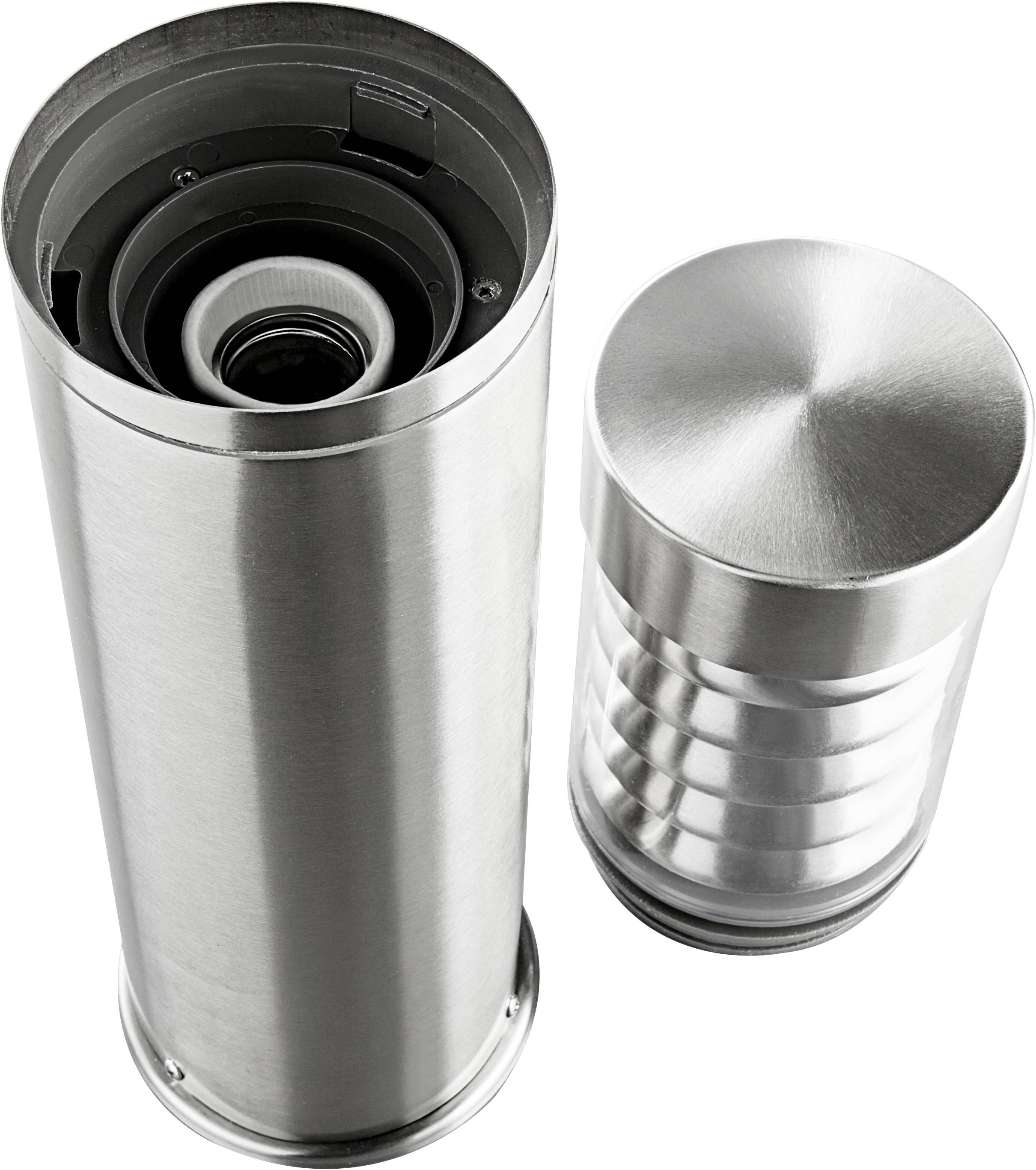 Dva stříbrné nerezové válce, jeden uzavřený a druhý otevřený, odhalují vnitřní mechanický design.