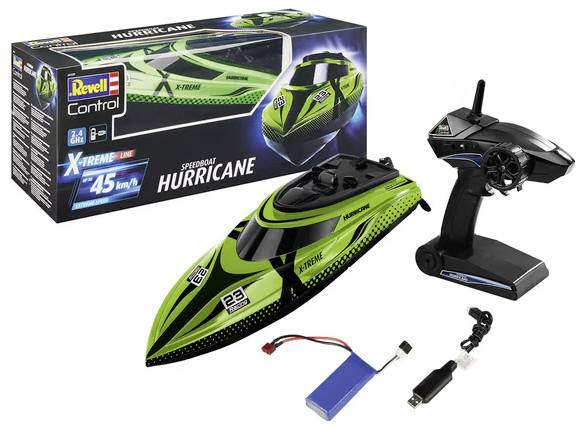 RC model motorového člunu se zelenou lodí, dálkovým ovládáním, baterií a nabíječkou. Na krabici je uvedeno označení modelu 'Hurricane', rychlost 45 km/h, od společnosti Revell Control.