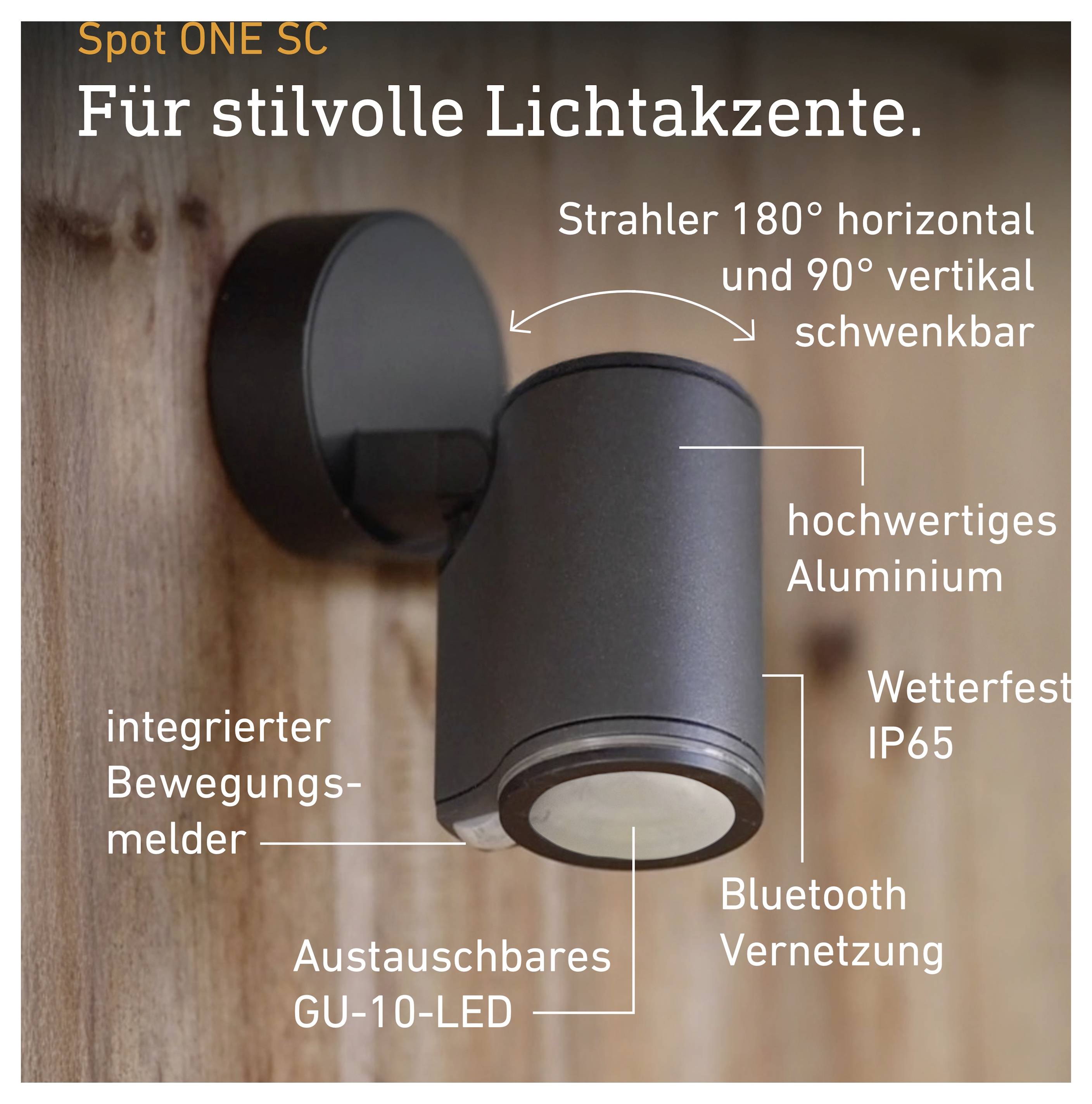 Spot ONE SC: černý nástěnný reflektor s detektorem pohybu, vyměnitelnou LED GU-10, Bluetooth propojení, odolný proti počasí IP65 a otočnou hlavicí světla.