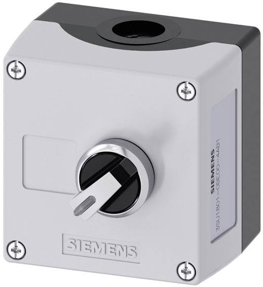 Bílé spínací zařízení Siemens s černým otočným knoflíkem uprostřed a šrouby v rozích.