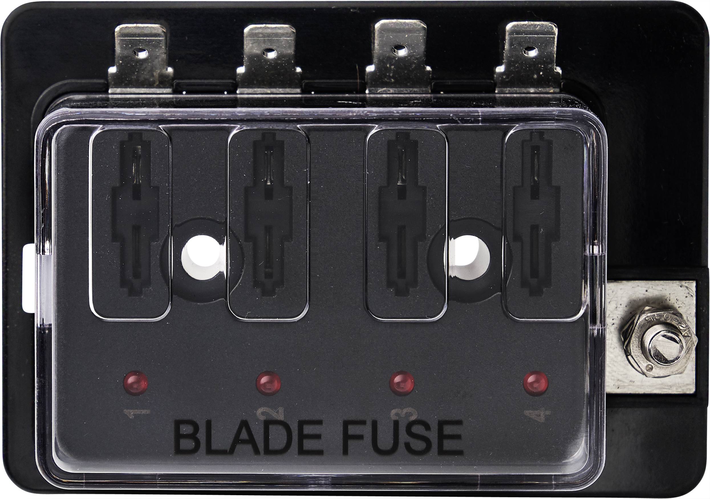 Pojistková skříň se čtyřmi svorkami pro nožové pojistky, číslovanými od 1 do 4, s nápisem 'BLADE FUSE'.