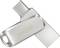 USB flash disk se stříbrným logem SanDisk, zobrazující konektor USB-C.