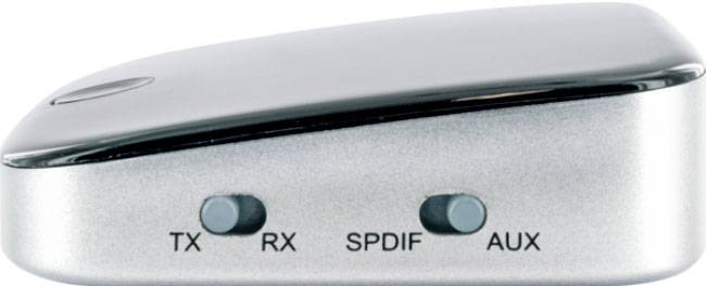 Stříbrný audio adaptér se třemi konektory: 'TX', 'RX', 'SPDIF' a 'AUX', určený pro různé audio připojení.