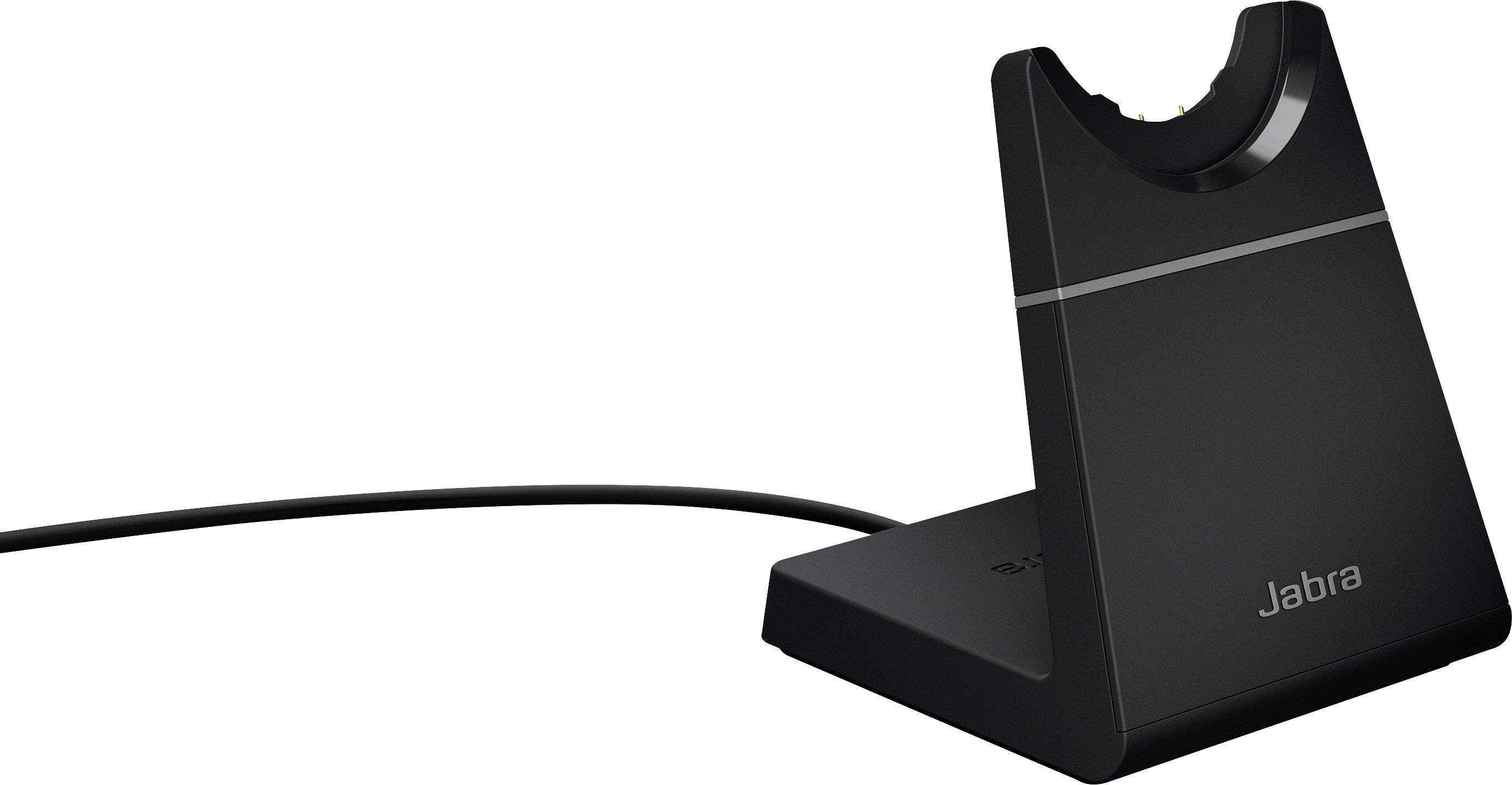 Dobíjecí stanice z černého plastu s logem Jabra, určená pro bezdrátová sluchátka. Kabel vede na zadní stranu stanice.