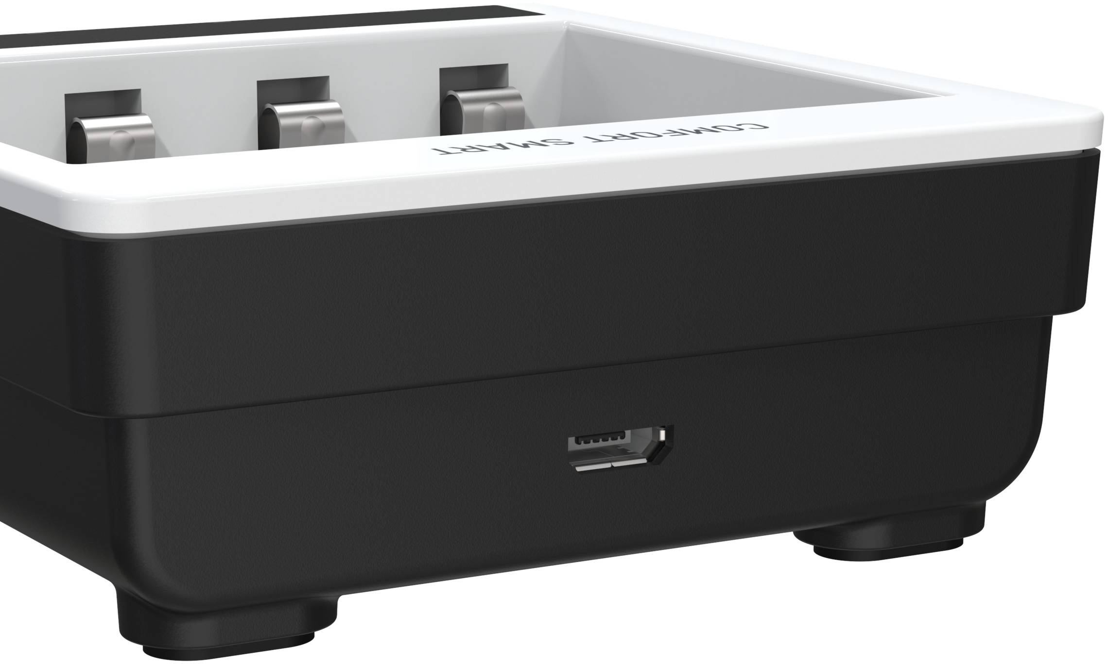 Černá a bílá elektronická nabíječka se třemi kovovými kontakty a USB portem na straně.