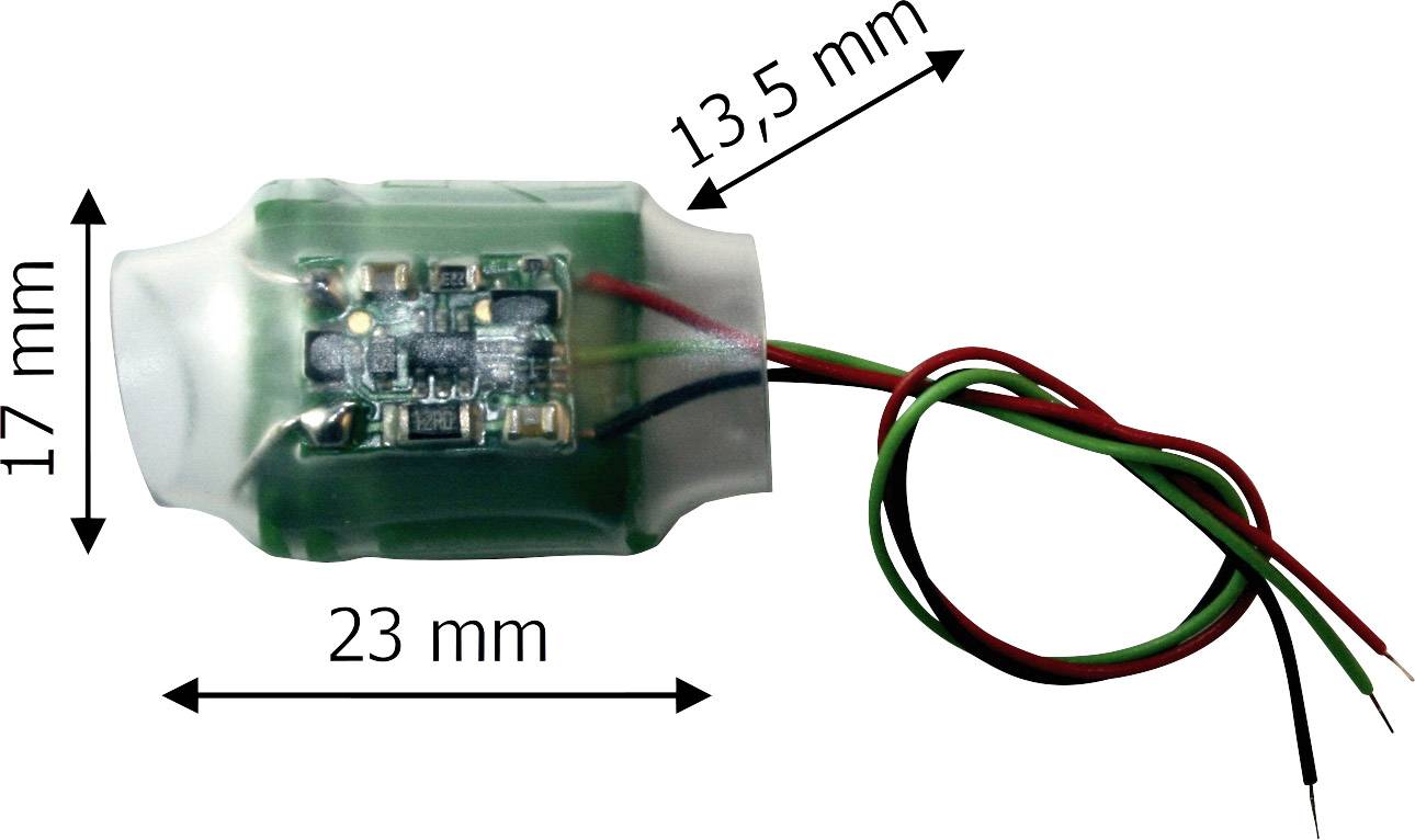 Malý, propojený elektronický obvod se zeleným plastovým krytem, dlouhý 23 mm, široký 17 mm, vysoký 13,5 mm.