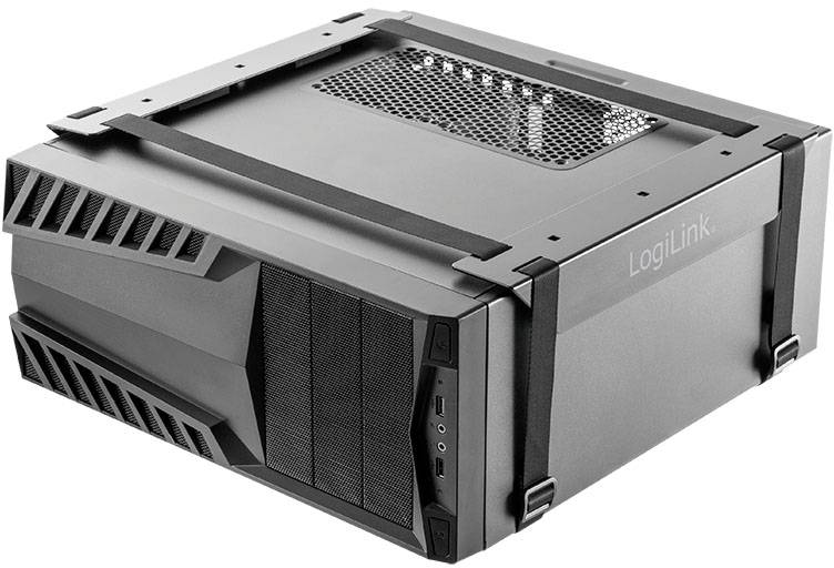 Černá počítačová skříň leží vodorovně na stole. Má moderní design s větracími otvory a několika konektory vpředu.