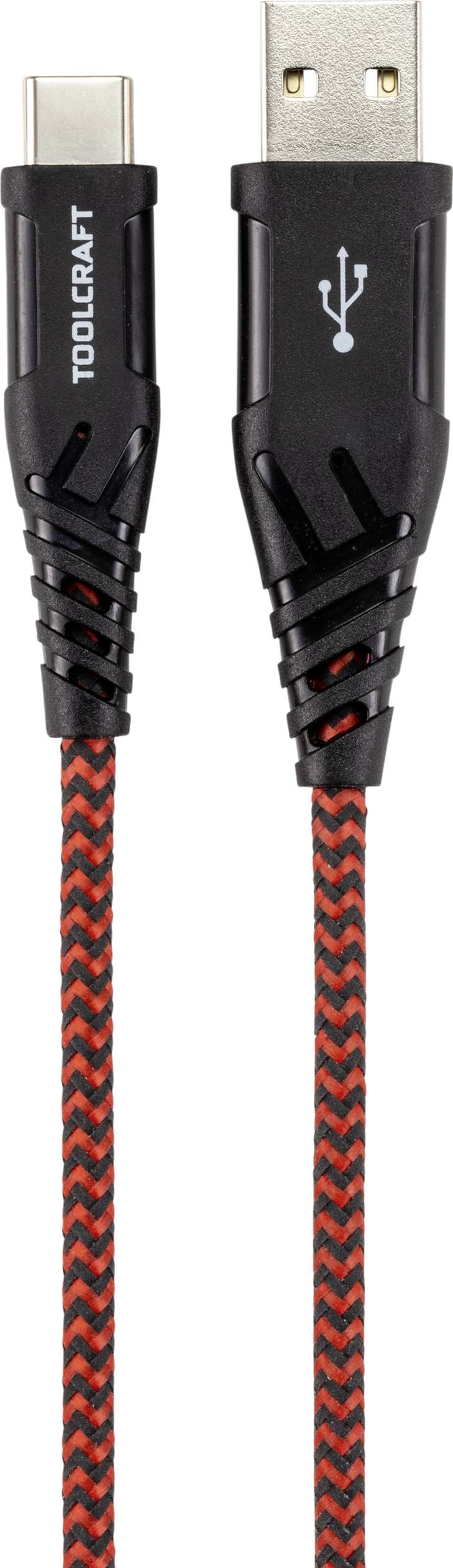 USB kabel s USB-A a USB-C konektory, černeno-červeně opletený. Značka "TOOLCRAFT" a USB symbol na konektorech.