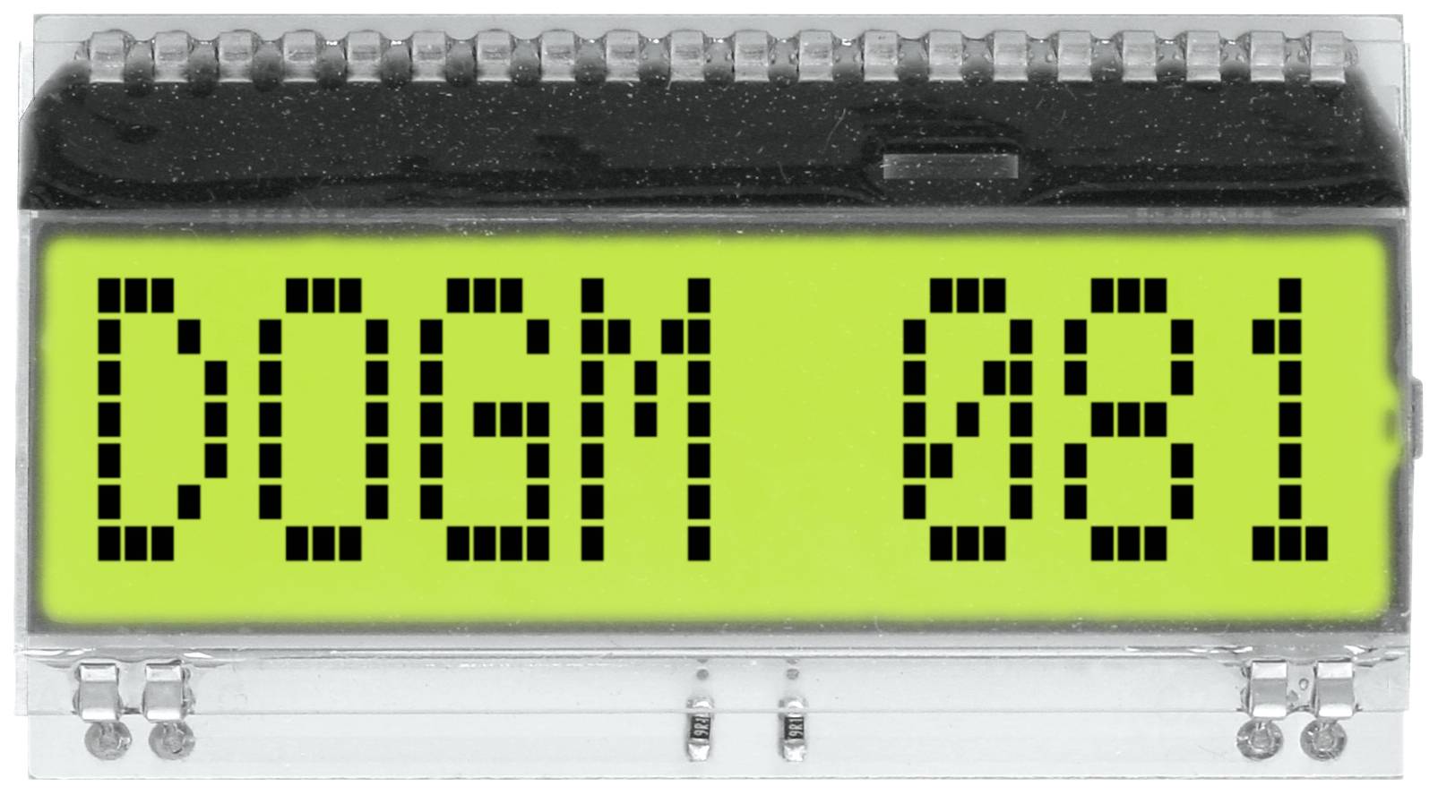LCD displej zobrazuje písmena 'DOGM 081'. Pozadí je zelené, text je černý a vypadá pixelově.