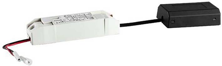 Bílé elektronické zařízení s připojeným černým kabelem, podobné LED ovladači nebo transformátoru.