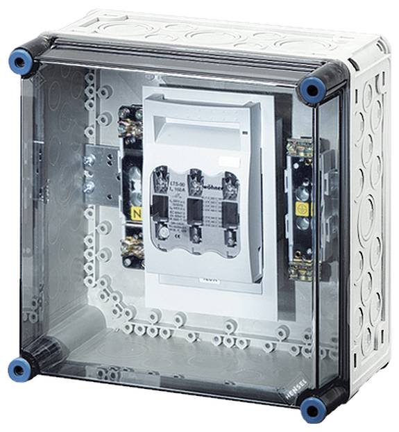Průhledná skříň s elektronickým rozváděčem a spínači, namontovaná na bílé desce. Vhodná pro technické instalace.