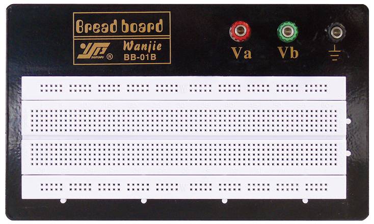 Černá nepájivá kontaktní deska (breadboard) s popisky. Nahoře jsou tři zdířky: červená ('Va'), zelená ('Vb') a černá ('Zem'). Pod nimi čtyři připojovací pole.