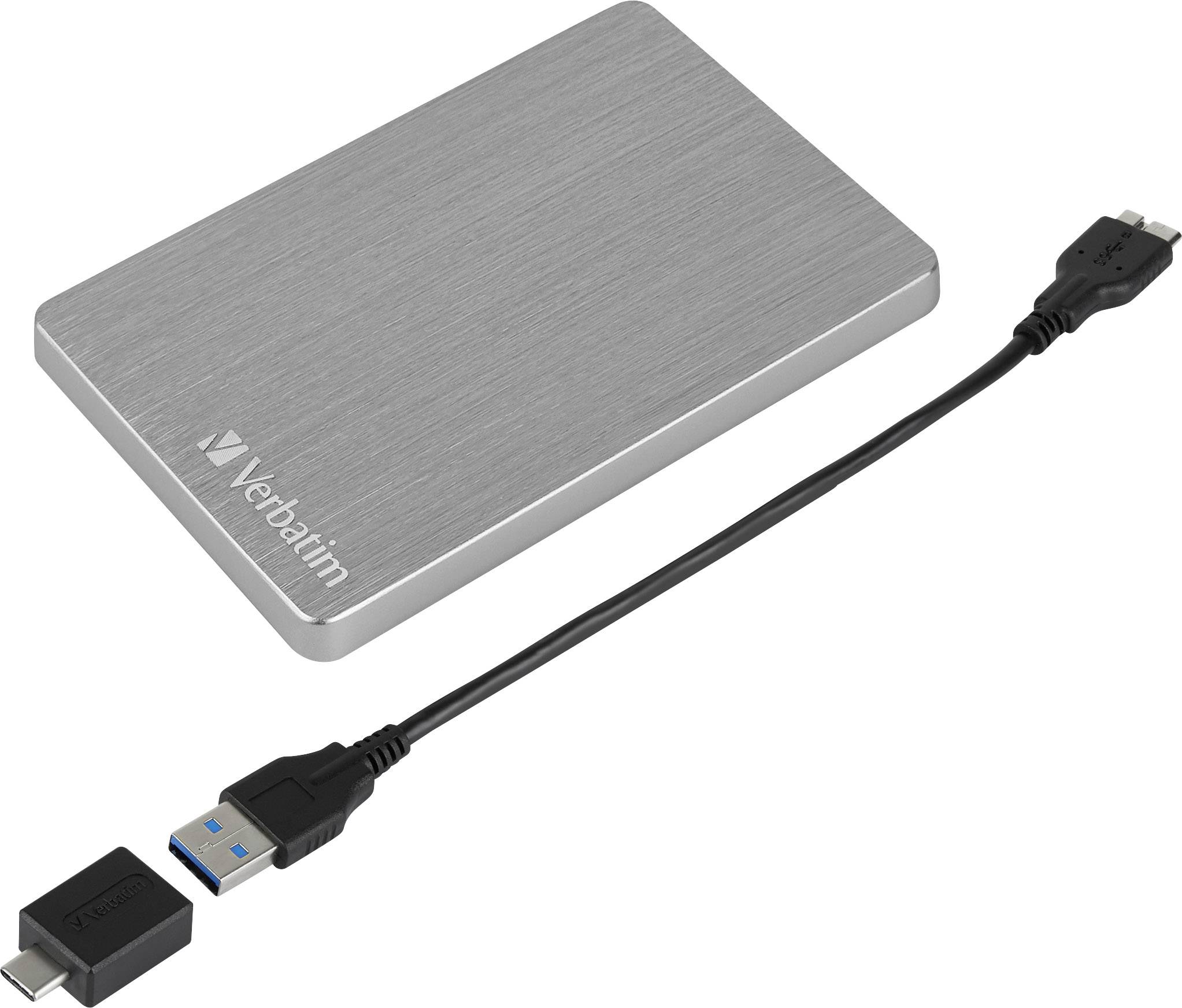 Externí pevný disk v stříbrné barvě s USB kabelem a adaptérem.