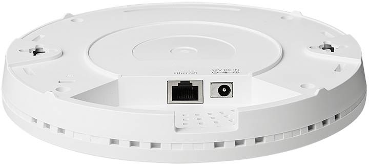 Bílý, kulatý WiFi router do stropu s ethernetovým a napájecím připojením na spodní straně.