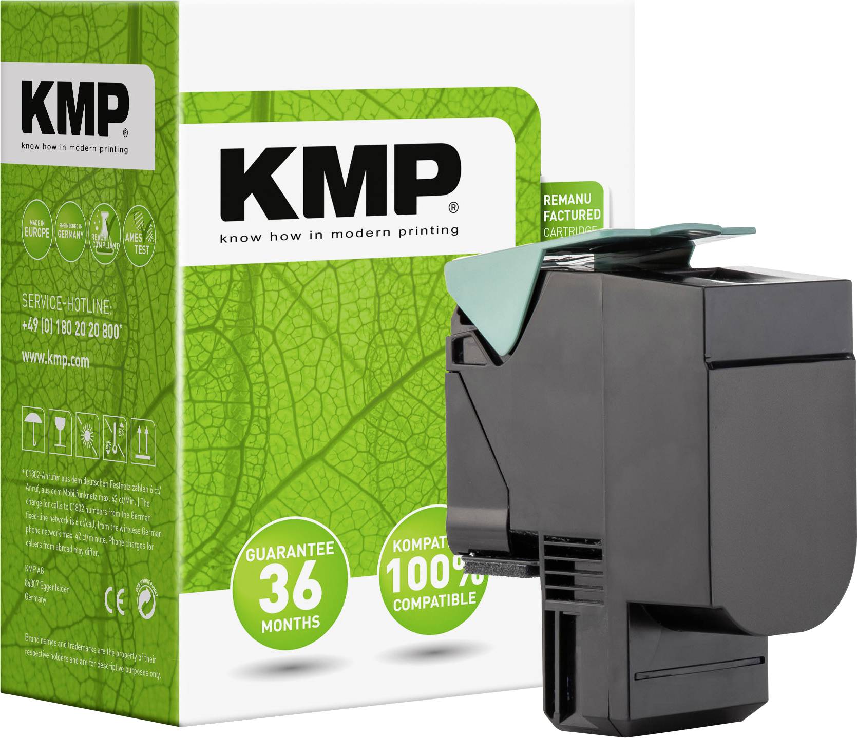 Černý plastový kryt tiskové kazety umístěný před krabičkou s motivem zeleného listu. Na obalu je text "KMP" a "100% kompatibilní".