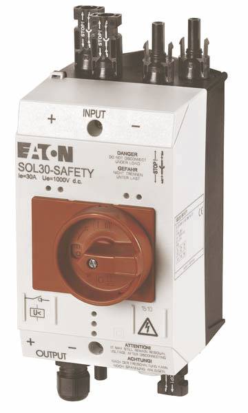 Elektrické zařízení s červeným otočným knoflíkem a nápisem 'Eaton SOL30-Safety', používané k řízení elektrických obvodů.