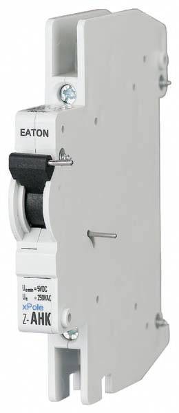 Bílý výkonový spínač značky Eaton s označením 'Z-AHK', který zobrazuje maximální napětí Uᵐᵃˣ 440V/UCᵉ 250VAC, umístěný na bílém povrchu.