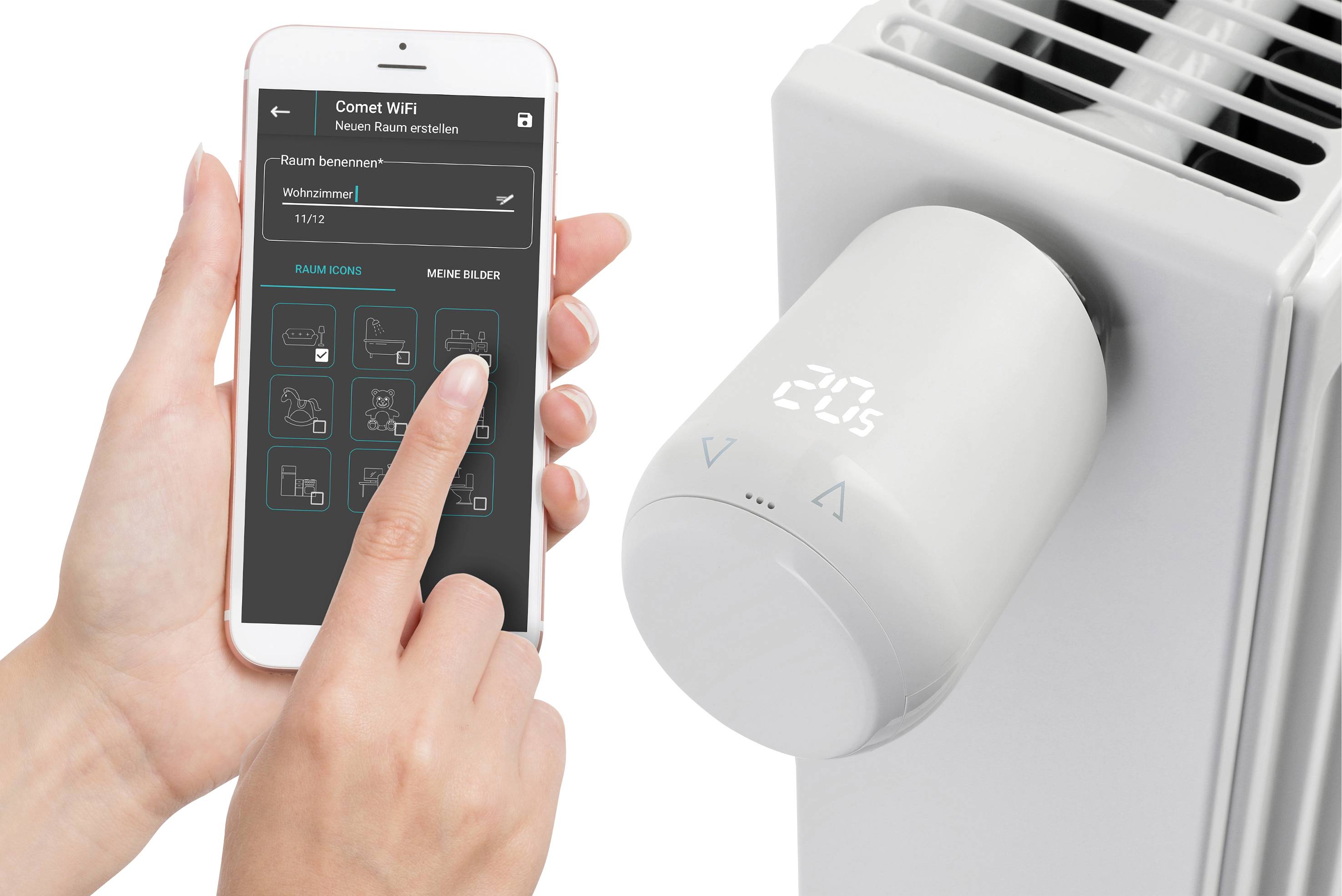 Osoba ovládá aplikaci v chytrém telefonu, aby nastavila teplotu digitálního termostatu na topném tělese.
