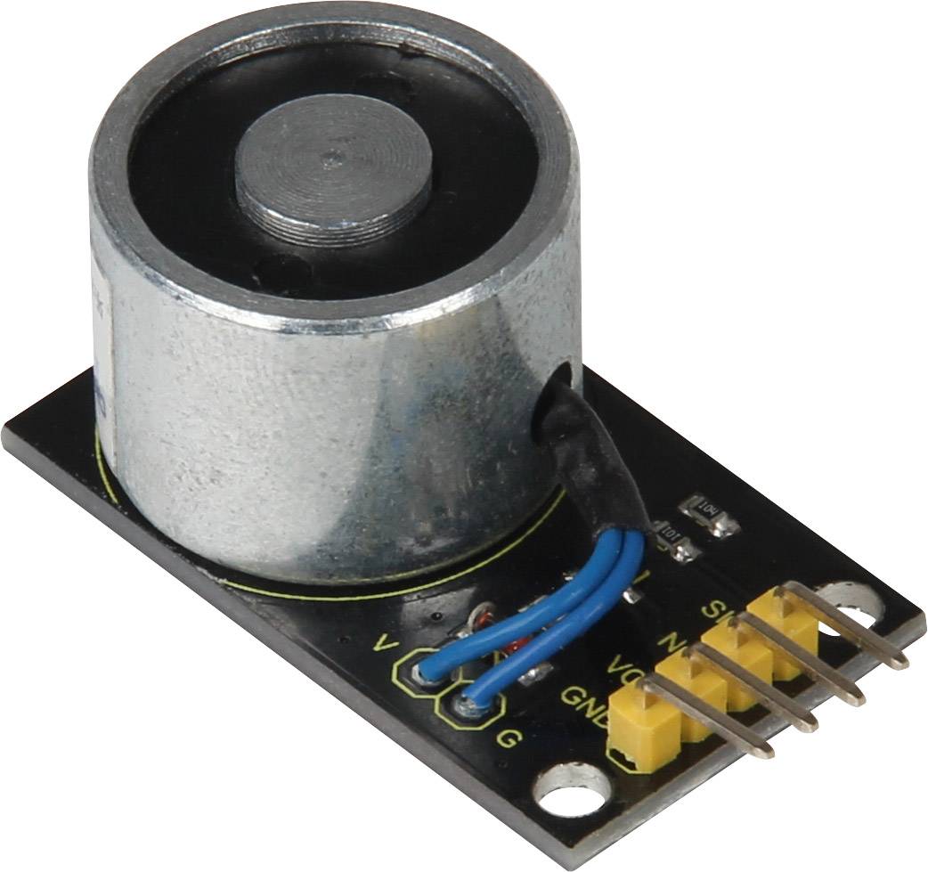 Kovový elektromagnet na černé desce plošných spojů s modrými a žlutými kabely, vedle zlatých konektorů.