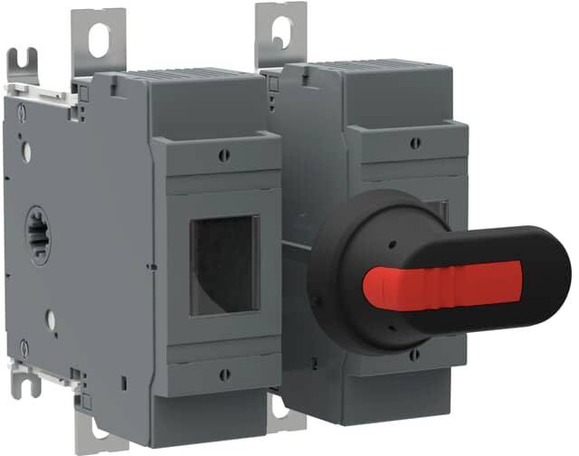 Šedý elektrický spínač s červeným a černým ovládacím prvkem, určený k montáži do rozvaděče, vhodný pro řízení elektrických zařízení.