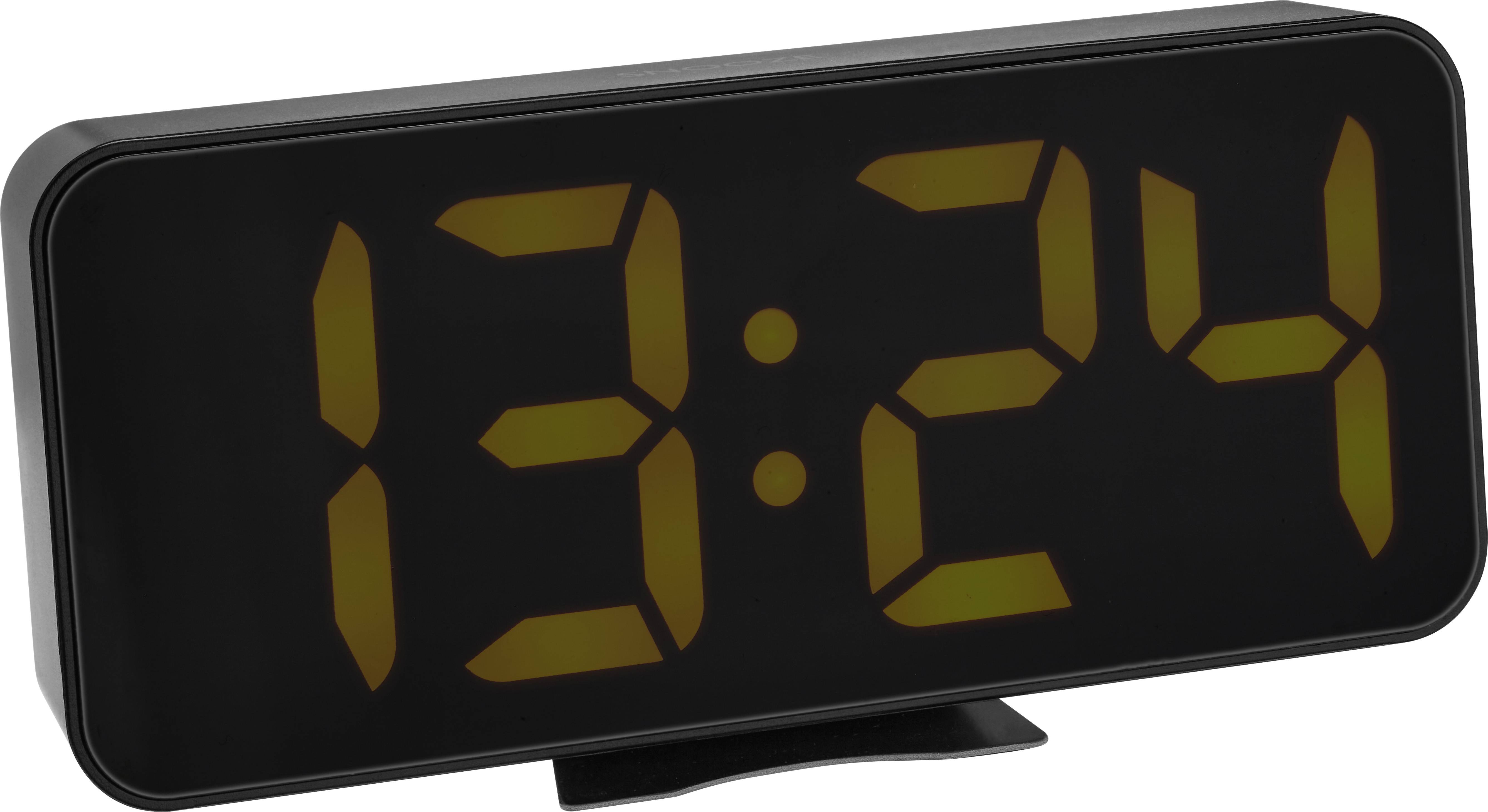 Digitální hodiny zobrazují '13:24' žlutou barvou na tmavém pozadí.