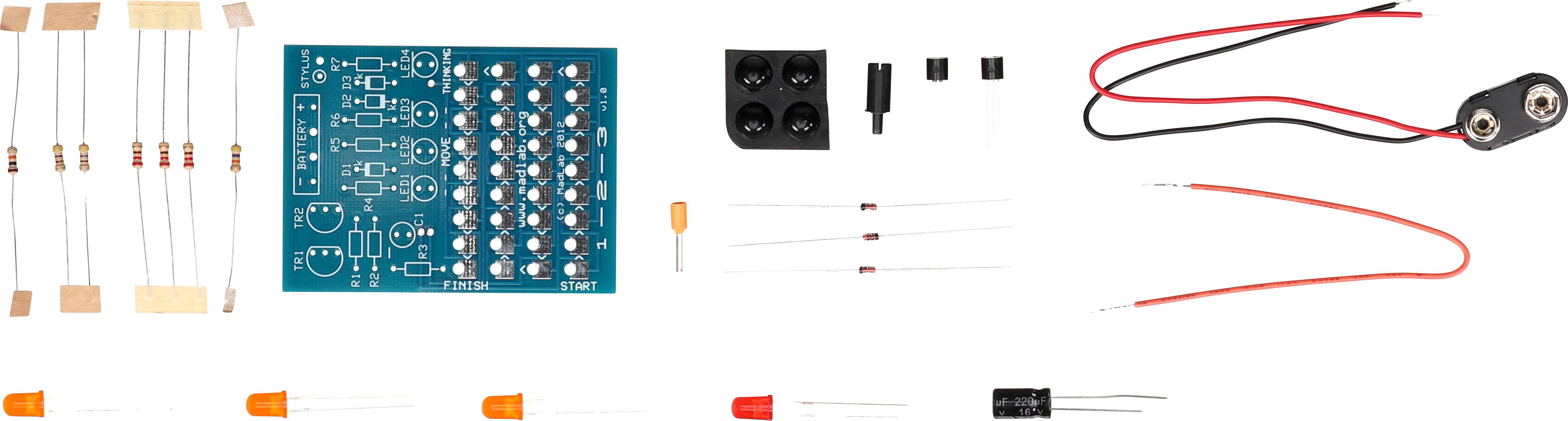 Elektronický stavebnicový set s deskou plošných spojů, rezistory, kondenzátory, LED diodami, vodiči a bateriovým konektorem, připravený k montáži.