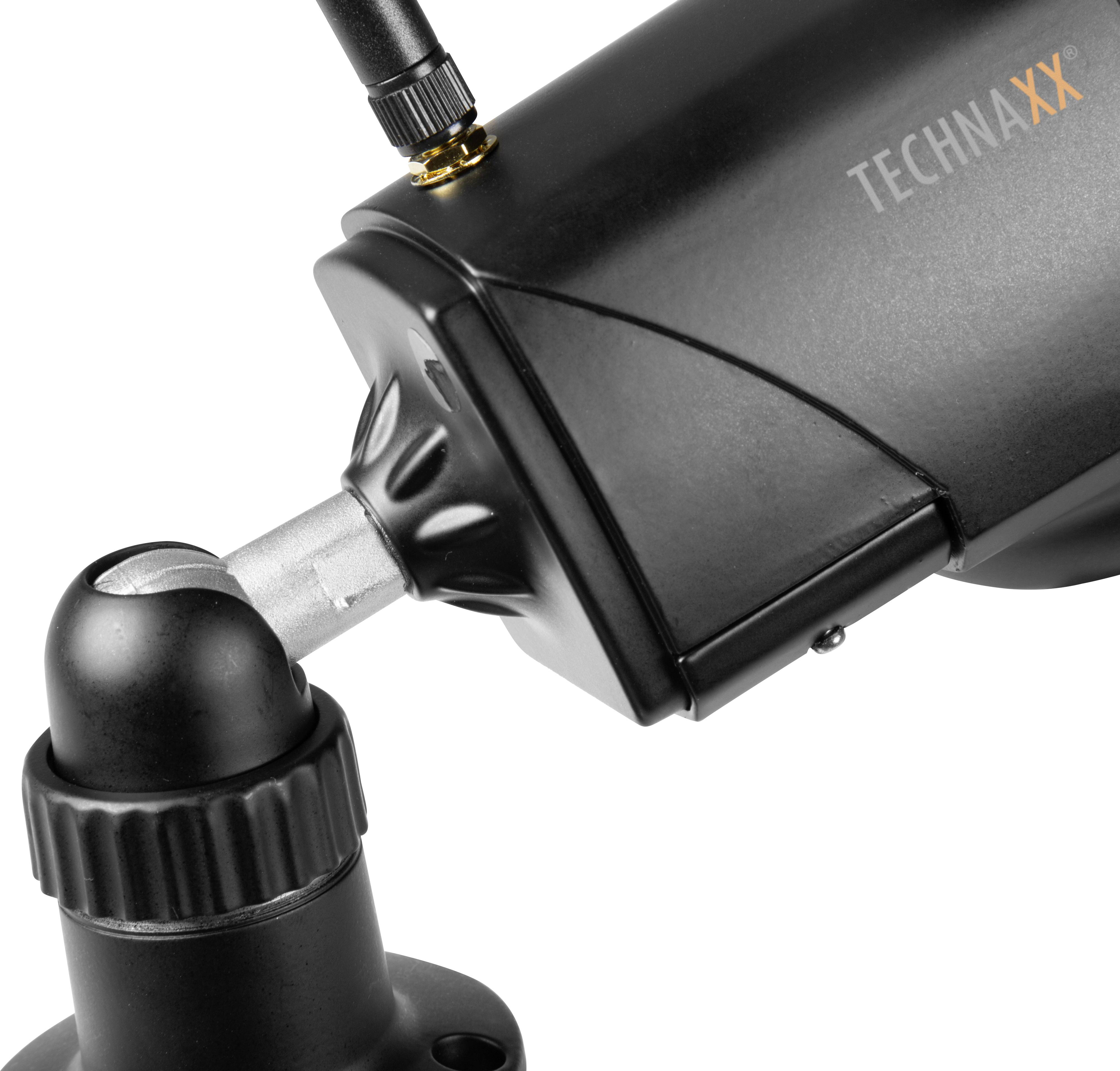 Černá bezpečnostní kamera s nápisem 'TECHNAXX', upevněná na nastavitelném stojanu.