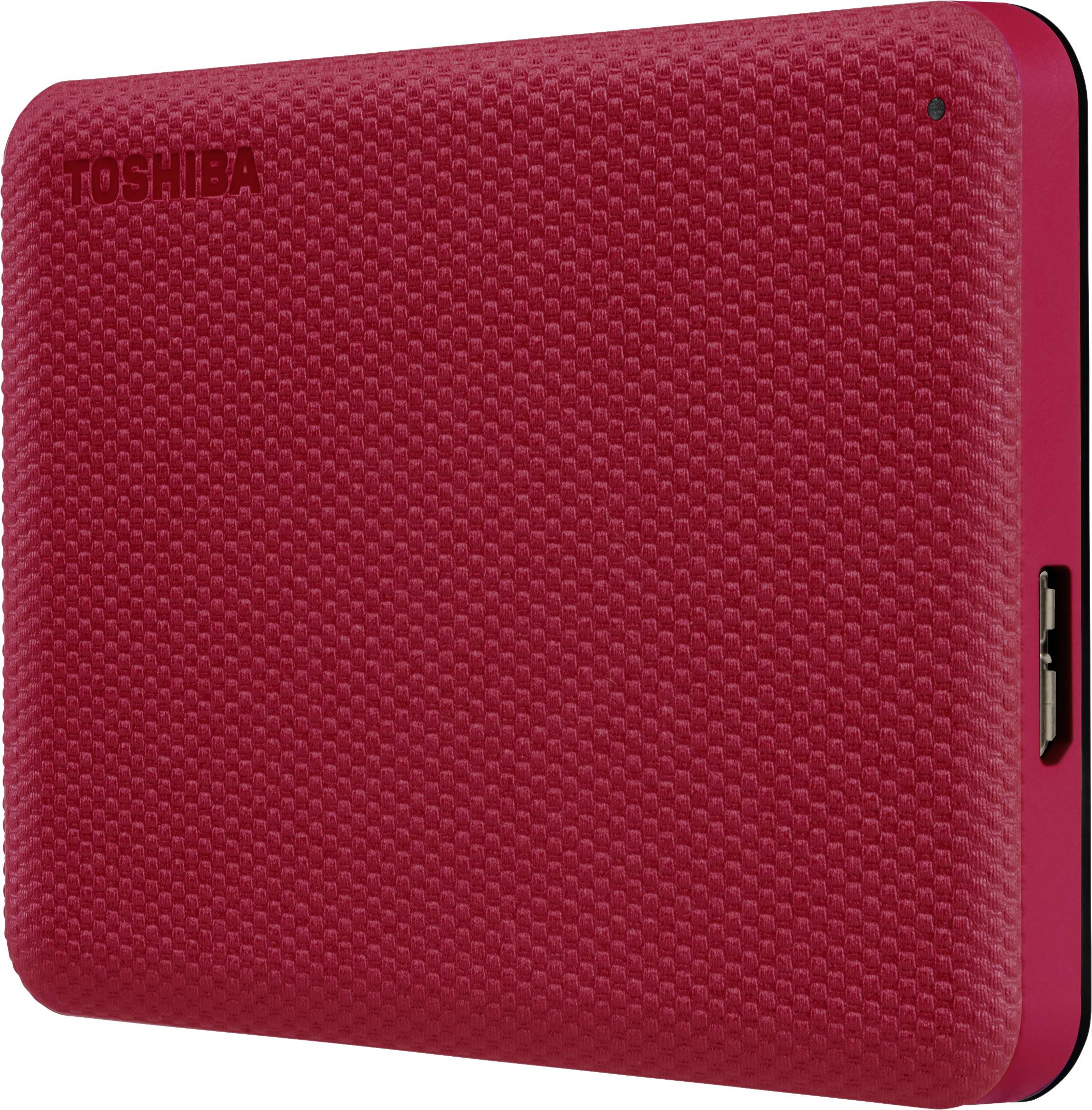 Externí pevný disk Toshiba s reliéfním povrchem a USB konektorem na boku.