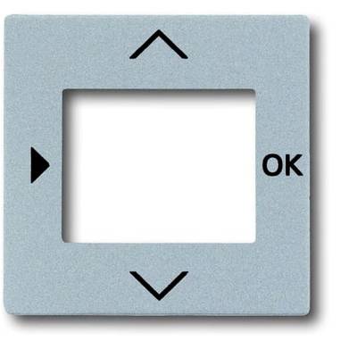Šedý obdélníkový ovládací panel se šipkami nahoru, dolů, doleva a tlačítkem 'OK' vpravo; ovládací prvek.