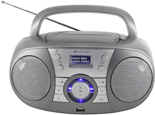 Přenosný rádio s integrovaným CD přehrávačem, dvěma reproduktory a displejem zobrazujícím nápis 'KLASSIK RADIO'.