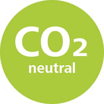 Znak 'CO2-neutrální' v zeleném kruhu symbolizuje ekologicky šetrné postupy nebo produkty, které nezanechávají žádnou stopu uhlíkových emisí.
