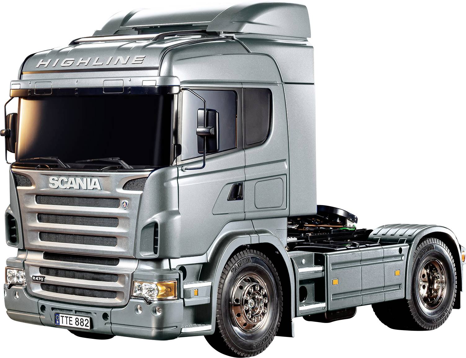 Stříbrný nákladní vůz Scania pohledem zepředu a lehce z boku. Nahoře nápis 'Highline'. Elegantní, moderní design s výrazným předním osvětlením.