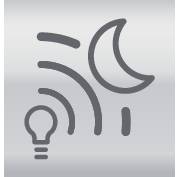 Symbol měsíce nad stylizovaným signálem WiFi a žárovkou, který představuje téma „Inteligentní osvětlení" v nočním čase.