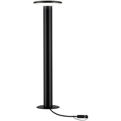 Černá válcovitá stojací lampa s kulatou základnou a kabelem s vidlicí.